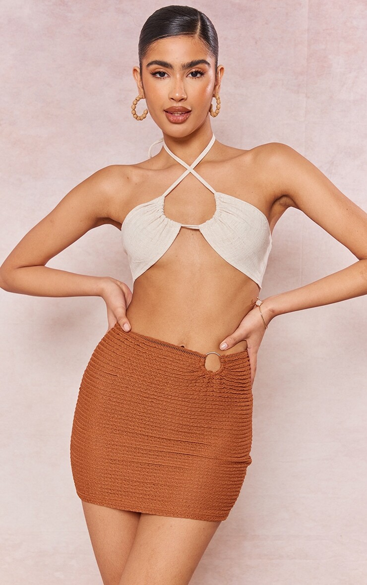 

PrettyLittleThing Мини-юбка из фактурного джерси шоколадного цвета с кольцами