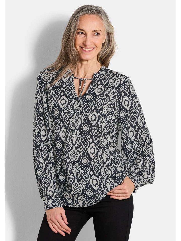 

Блузка-рубашка, современная блузка с воланами и воротником-стойкой, черного цвета / с рисунком GOLDNER