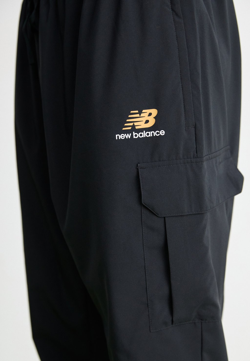 

Спортивные брюки CLASSICS JOGGER New Balance, черный