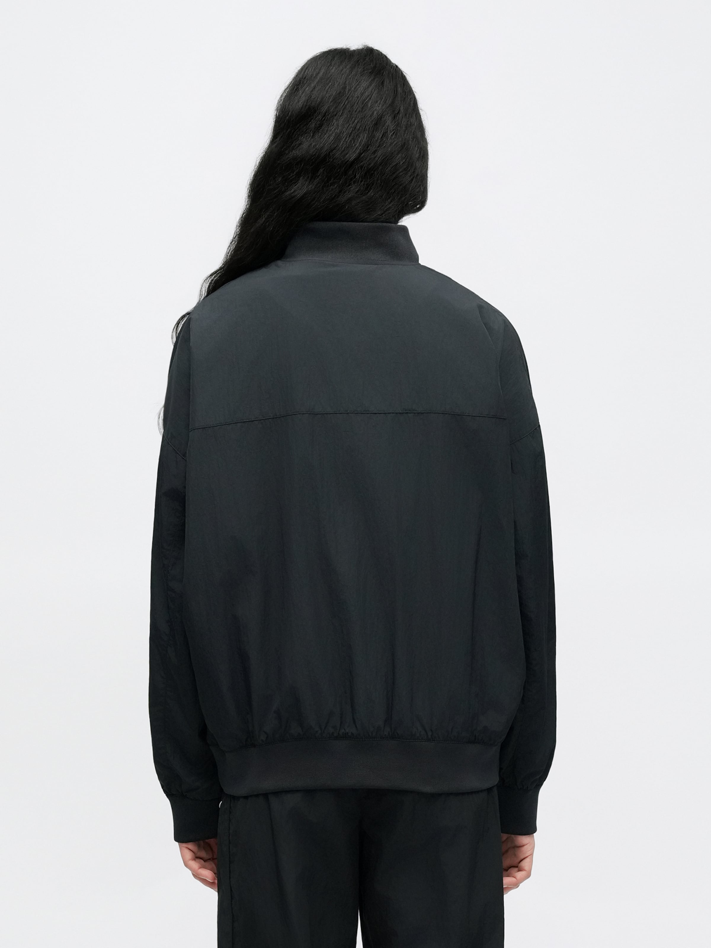 Nike Sportswear Куртка межсезонная 'HBR VARSITY' в черном цвете — фото 3