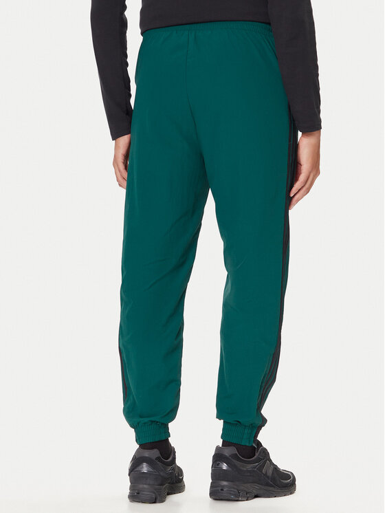 Спортивные брюки regular fit adicolor Woven Firebird JY1335 Adidas, зеленый — фото 3