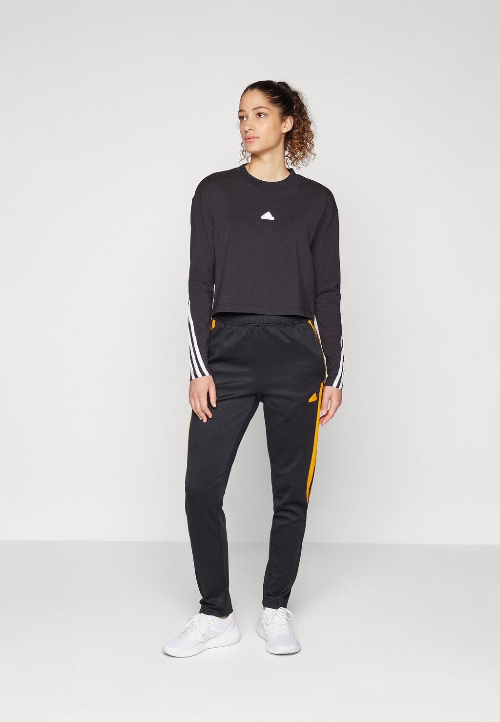 

Брюки спортивного костюма Tiro Cut Stripes Trackpants adidas Sportswear, черный