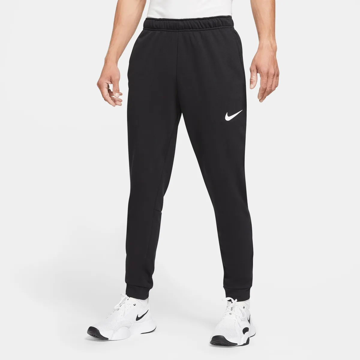 

Тренировочные брюки Nike "DRI-FIT MEN'S TAPERED TRAINING PANTS", черный