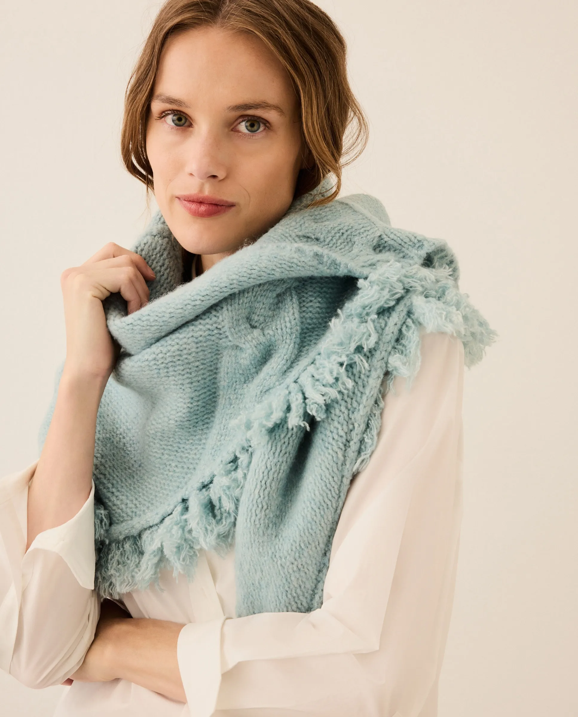 

Вязаная шапка однотонного цвета Stella Rittwagen