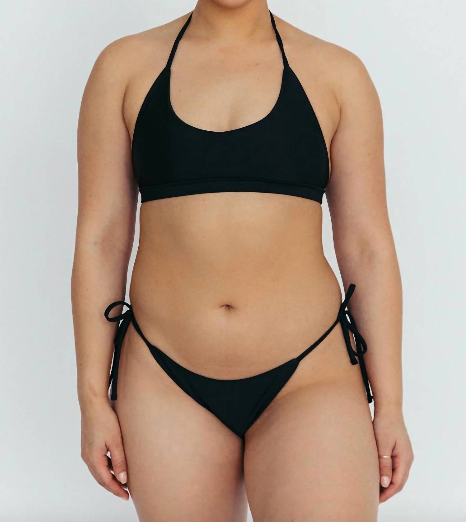 

Купальник Halle с бретелями в черном цвете The Saltwater Collective