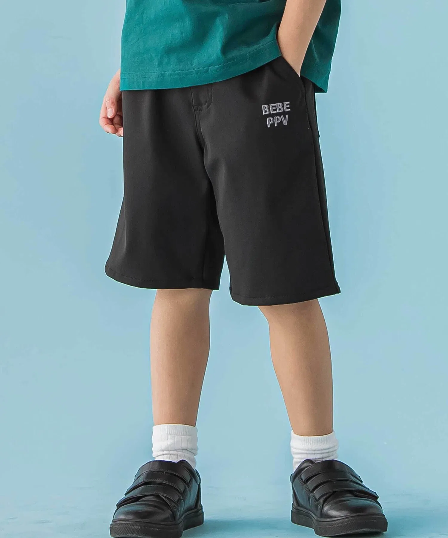 Детские шорты BeBe Petits Pois Vert с треугольной вставкой чёрные