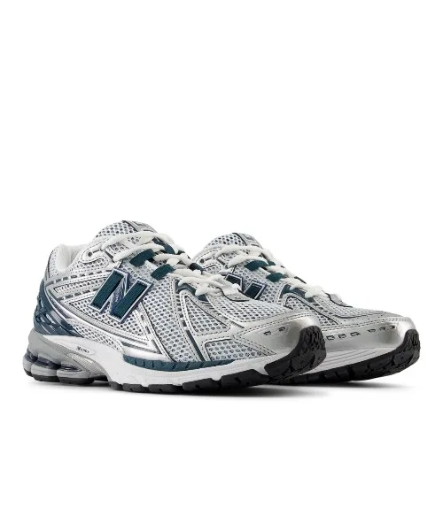 Кроссовки с технологией cushioning Kinetics New Balance 1906R серебристые