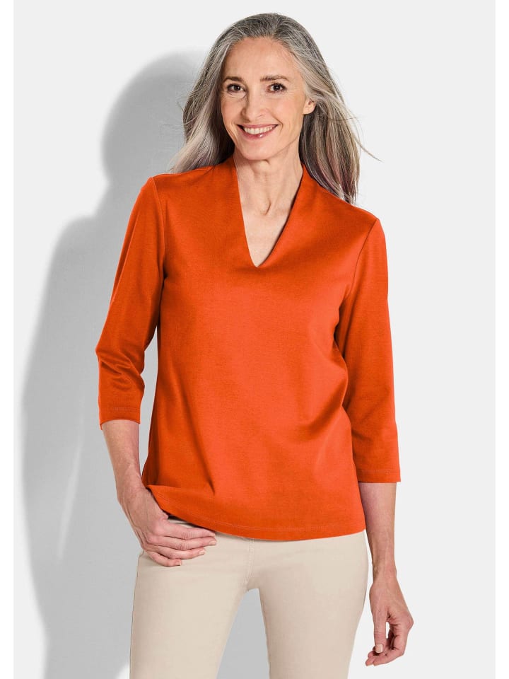 

Элегантная базовая рубашка с V-образным вырезом терракотового цвета GOLDNER