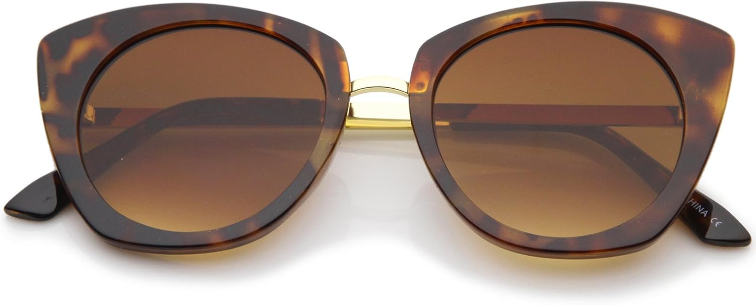 

Женские солнцезащитные очки zeroUV в массивной оправе с металлическими дужками, плоскими линзами, круглой формы, «кошачий глаз», диаметр линз 52 мм, Tortoise-gold / Amber