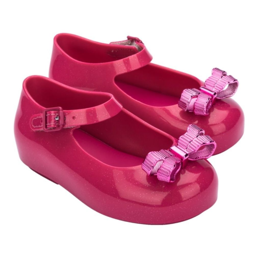 

Розовые блестящие туфли-желе с бантом Melissa