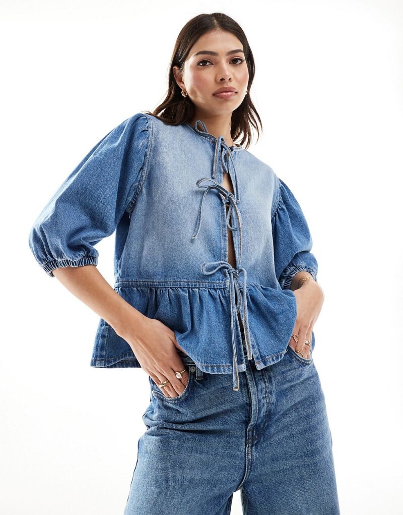 

Джинсовая блузка с пышными рукавами и завязкой спереди ASOS DESIGN