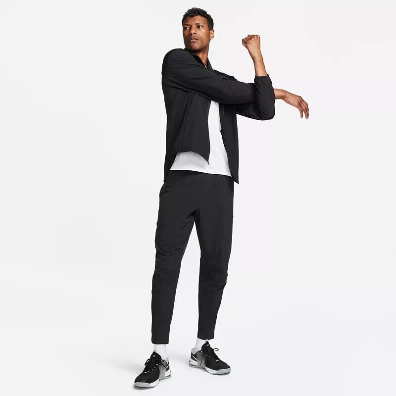 Мужские универсальные зауженные брюки Nike Dri-FIT Unlimited, черный — фото 2
