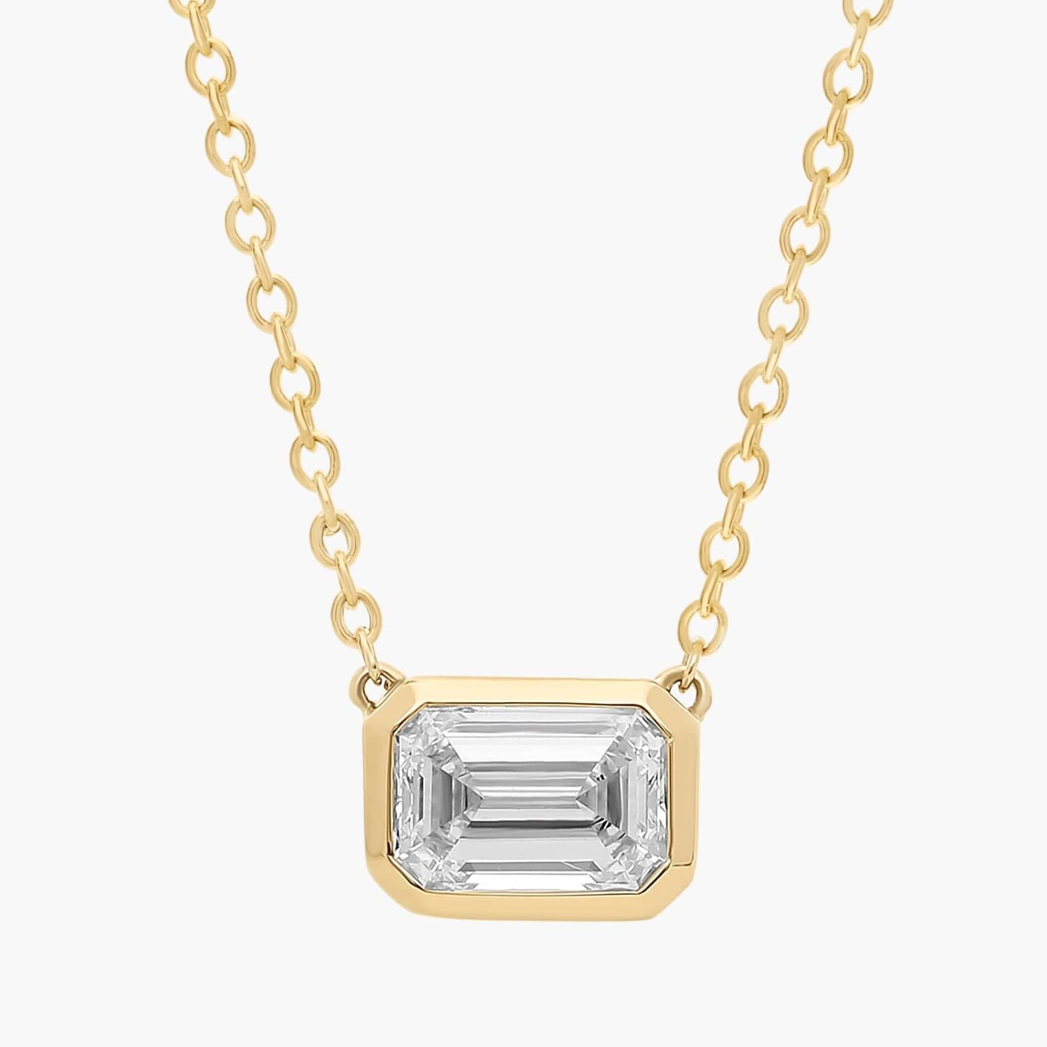 

Подвеска East West с бриллиантами изумрудной огранки из желтого золота 14 карат (1 карат Tw. - HI / SI1-SI2) Blue Nile