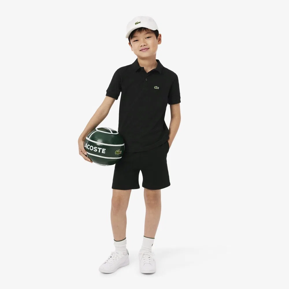 Детская базовая футболка-поло с коротким рукавом серая от Lacoste — фото 4