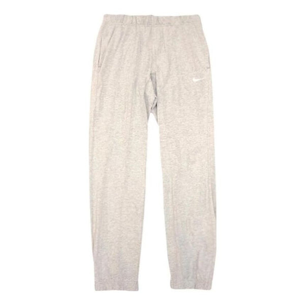 

Брюки Essential Swoosh Jogger Nike, серый