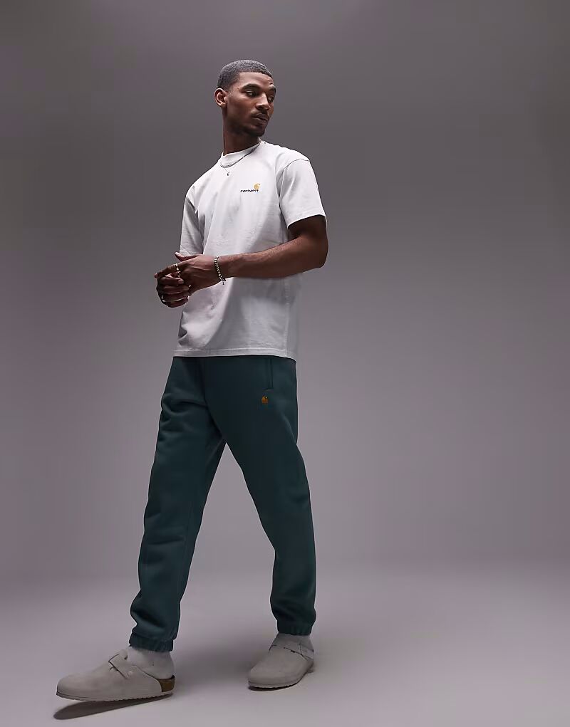 

Спортивные штаны Carhartt WIP Chase зеленого цвета