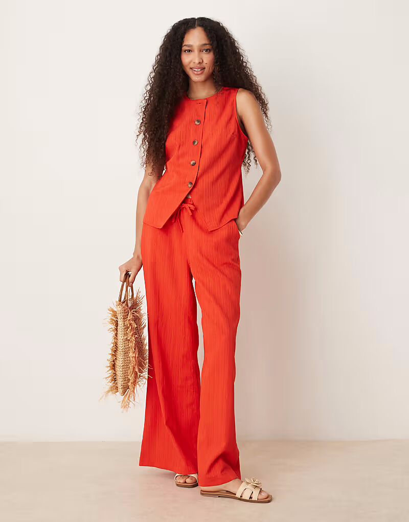 

Комбинируемые брюки-палаццо ASOS DESIGN с мятым узором оранжевого цвета