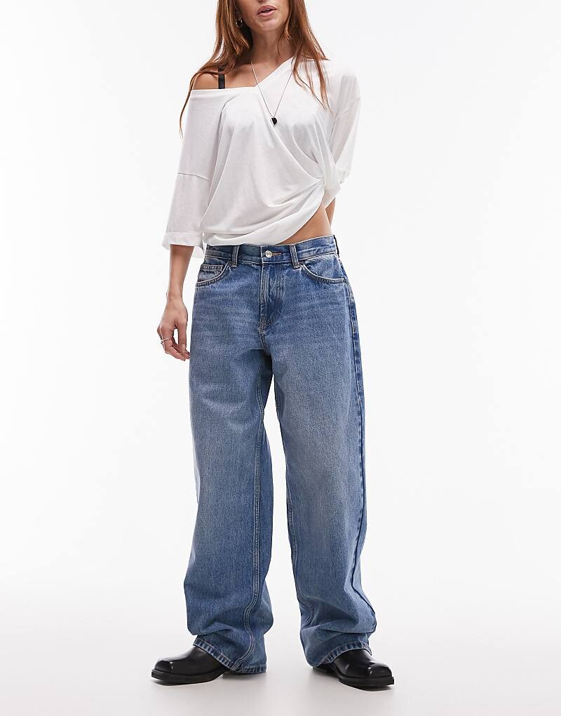 

Topshop – Синие джинсы с заниженной талией и ремешком сзади