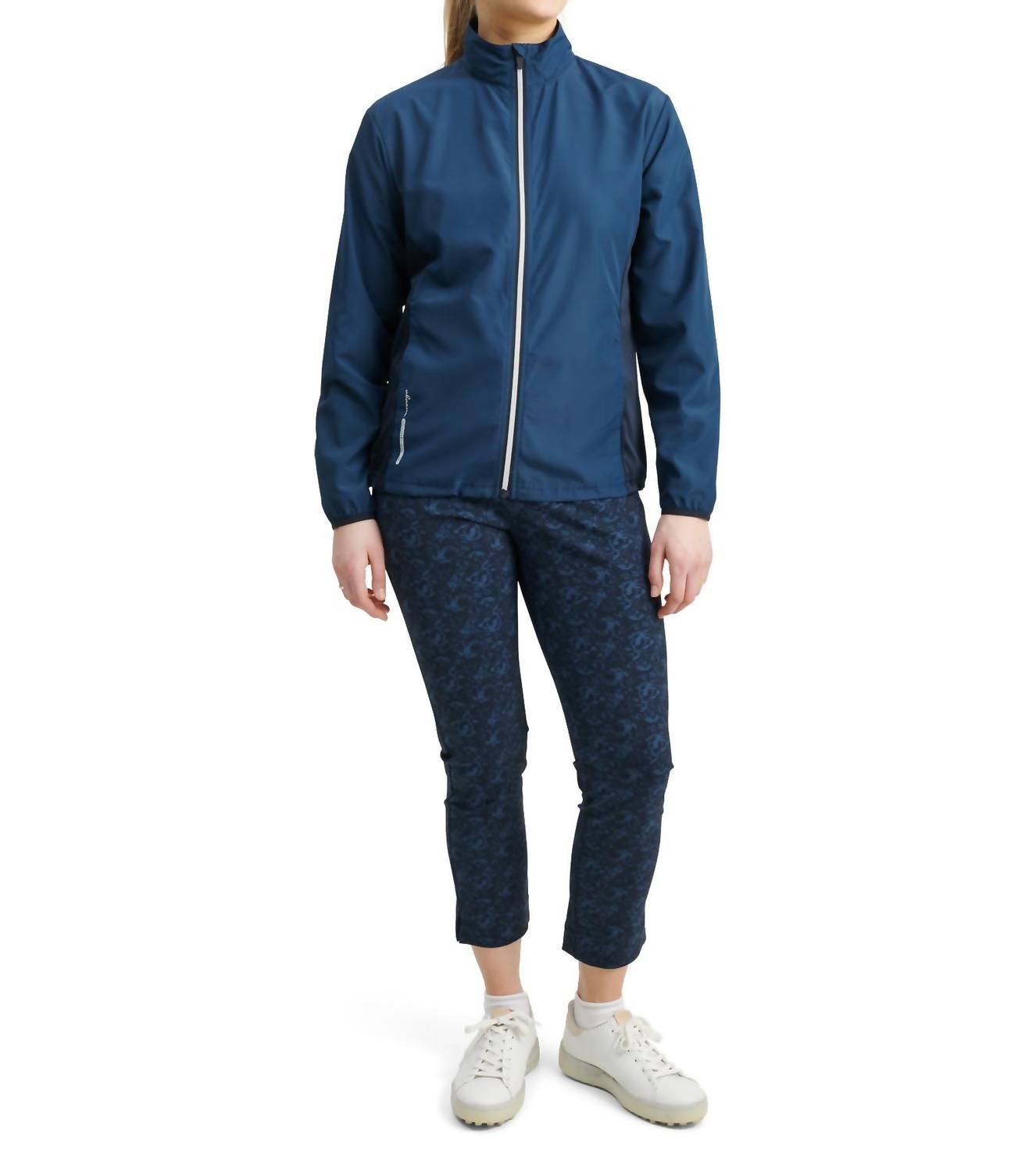 

Женская куртка Ganton Stretch Wind Jacket в павлиньем синем цвете Abacus Sportswear US