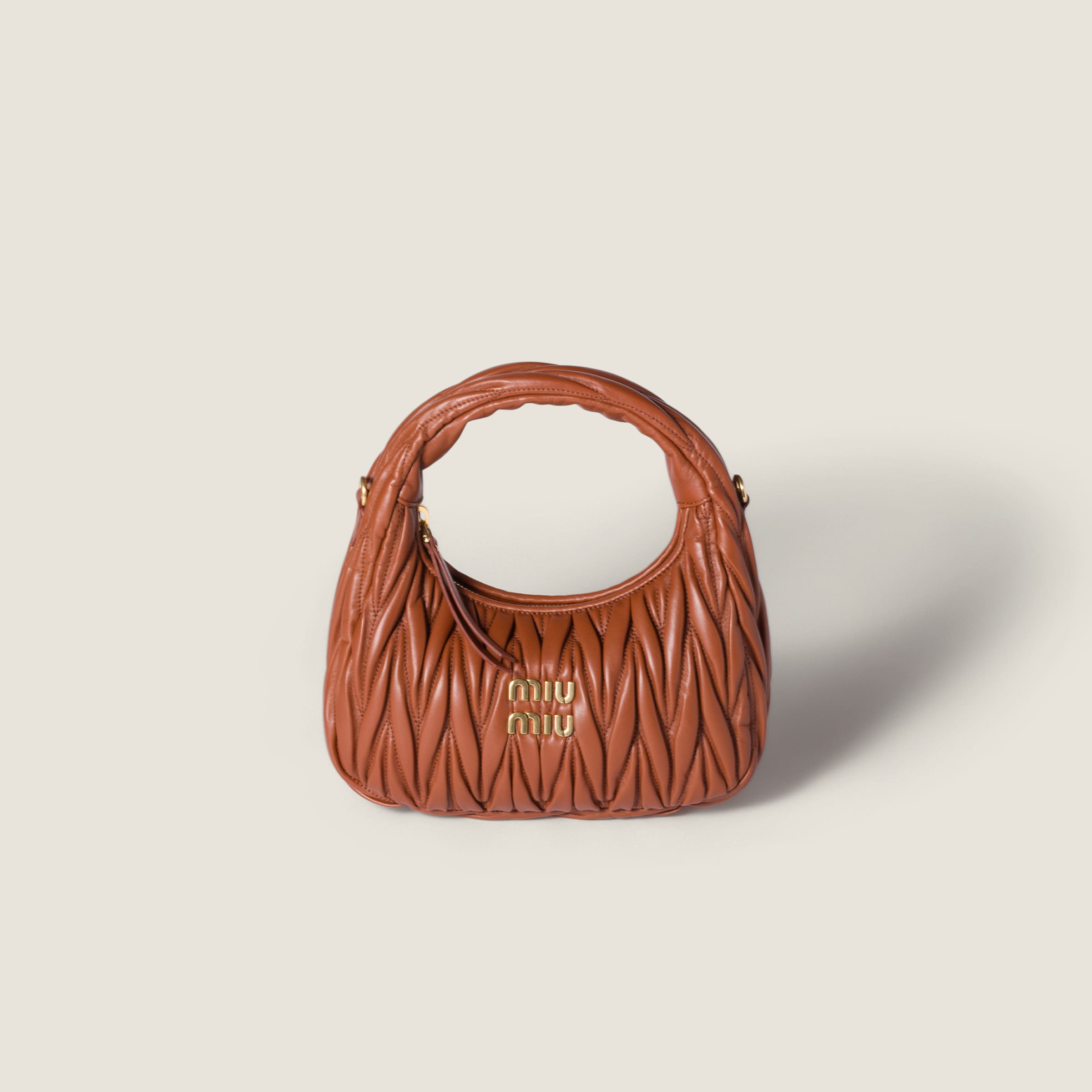 

Сумка-хобо wander из мателассé из наппы MIU MIU, ржавчина