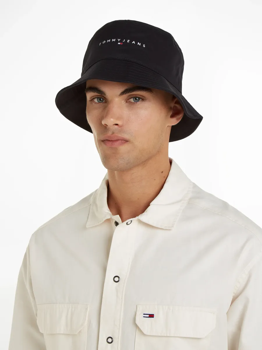 

Панама Tommy Jeans "TJM LINEAR LOGO BUCKET HAT" с вышитой надписью логотипа, черный