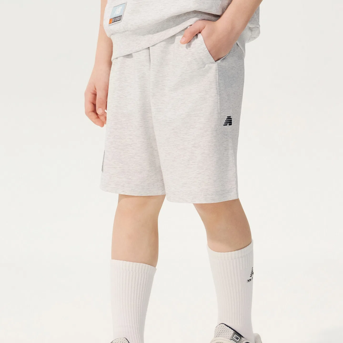 Детские быстросохнущие штаны New Balance Светло-серые — фото 3
