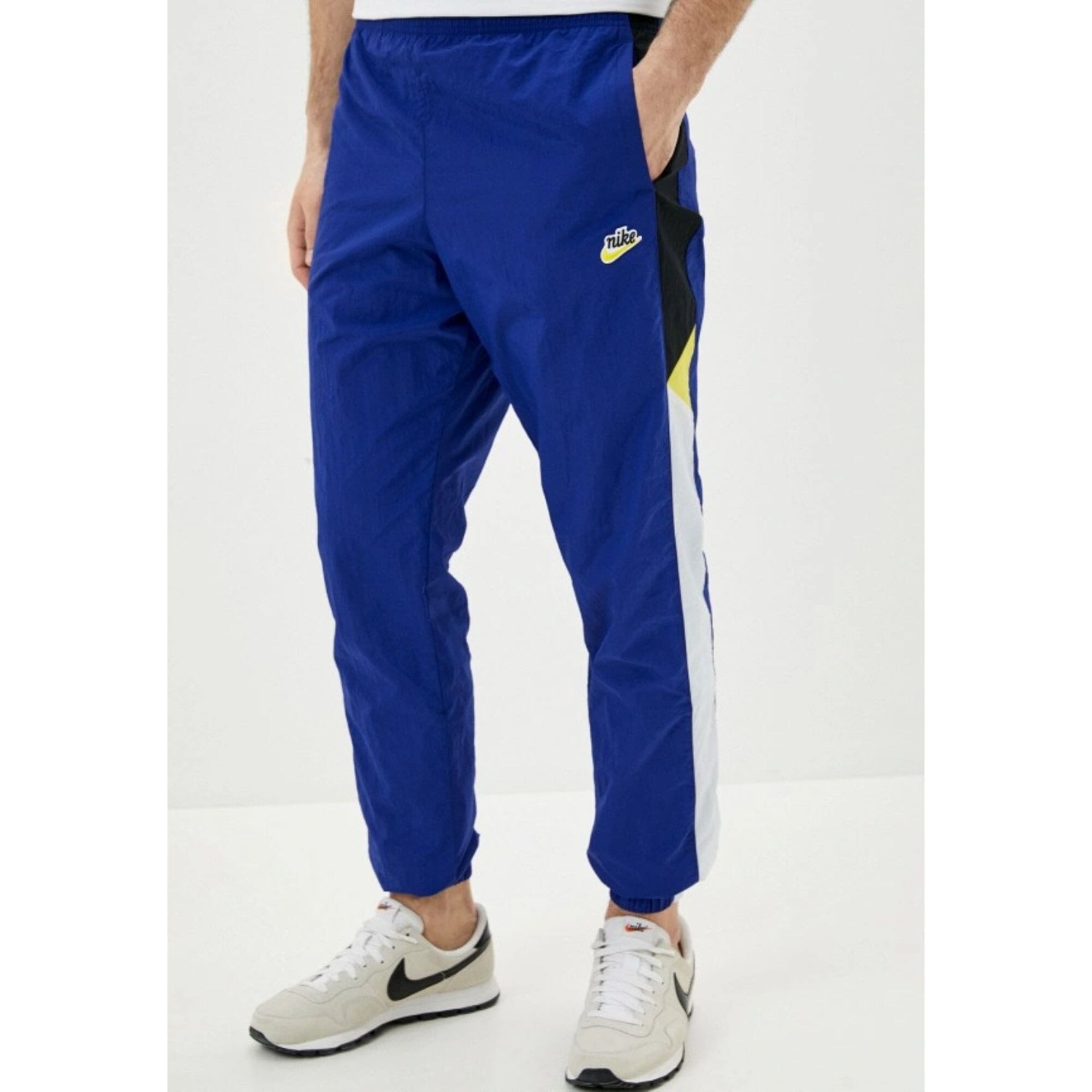 

Брюки Nike Sportswear Heritage Windrunner синие/желтые CJ5484-455 мужские
