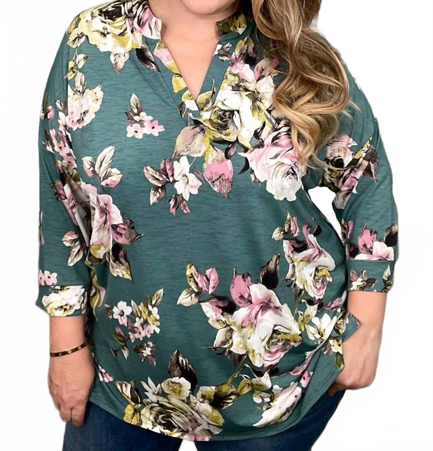 

Туника-топ с цветочным воротником-стойкой в стиле «Габби» в сине-зеленом цвете Honeyme