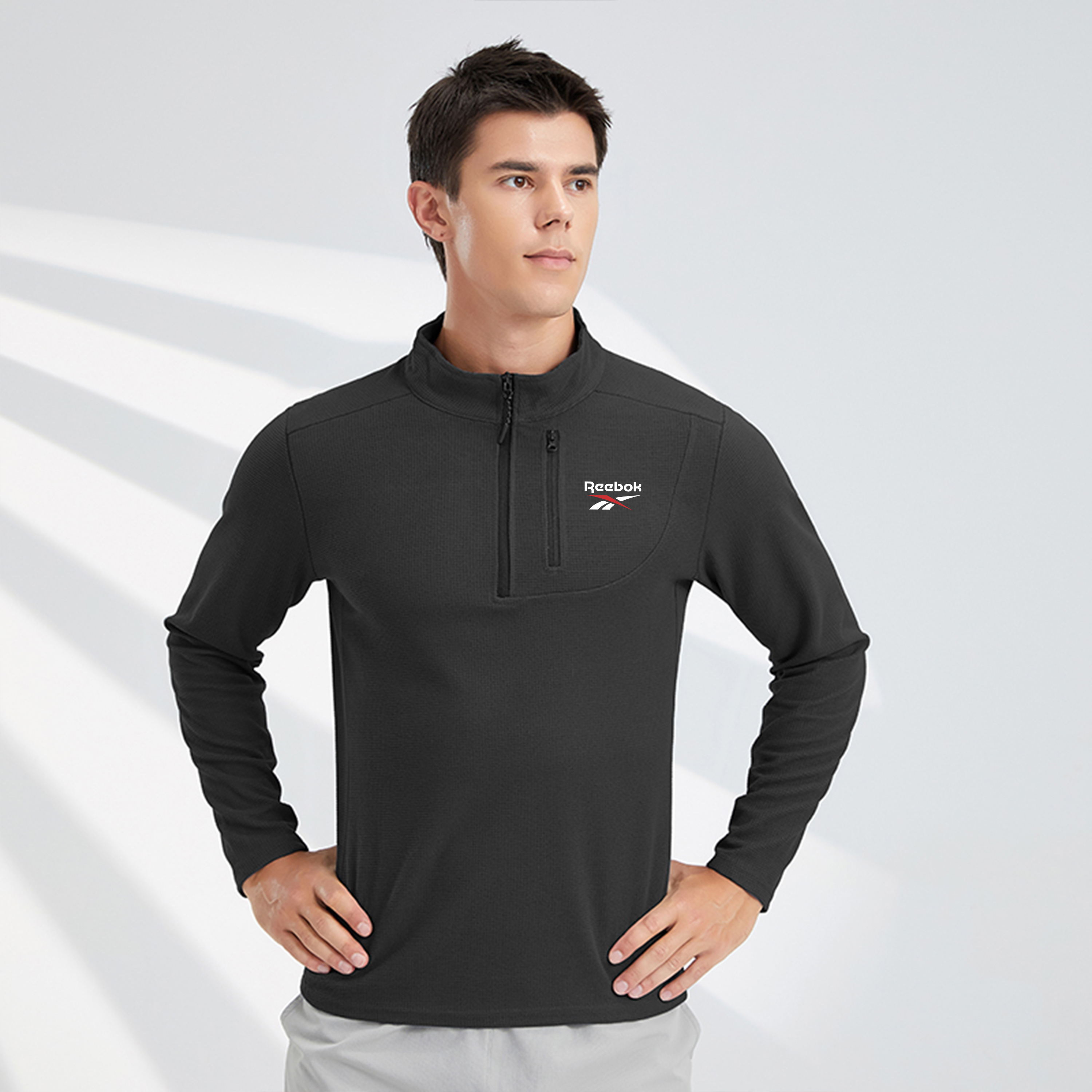 

Футболка Unisex Stand Collar Moderate Reebok, светло-серый