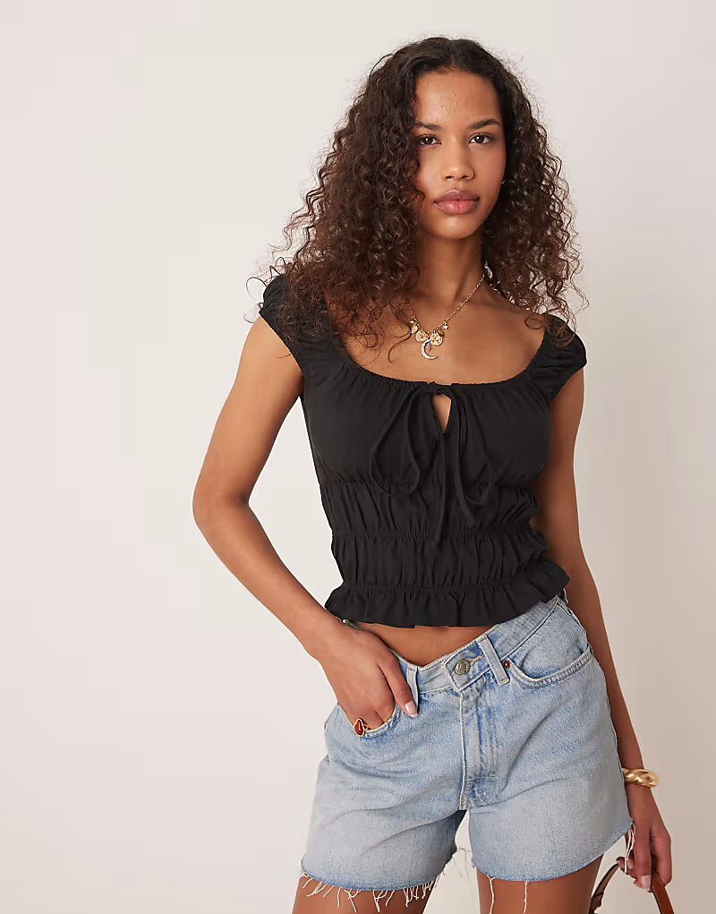 

Топ с короткими рукавами ASOS DESIGN молочница черного цвета