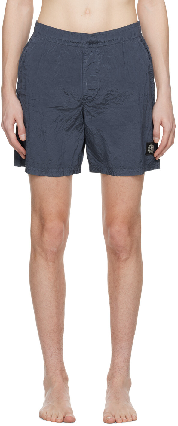 

Синие шорты для плавания с нашивками Stone Island