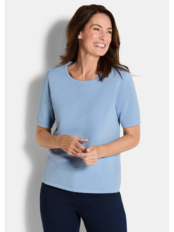 

Короткий размер: светло-голубой трикотажный свитер/рубашка с короткими рукавами и круглым вырезом. GOLDNER