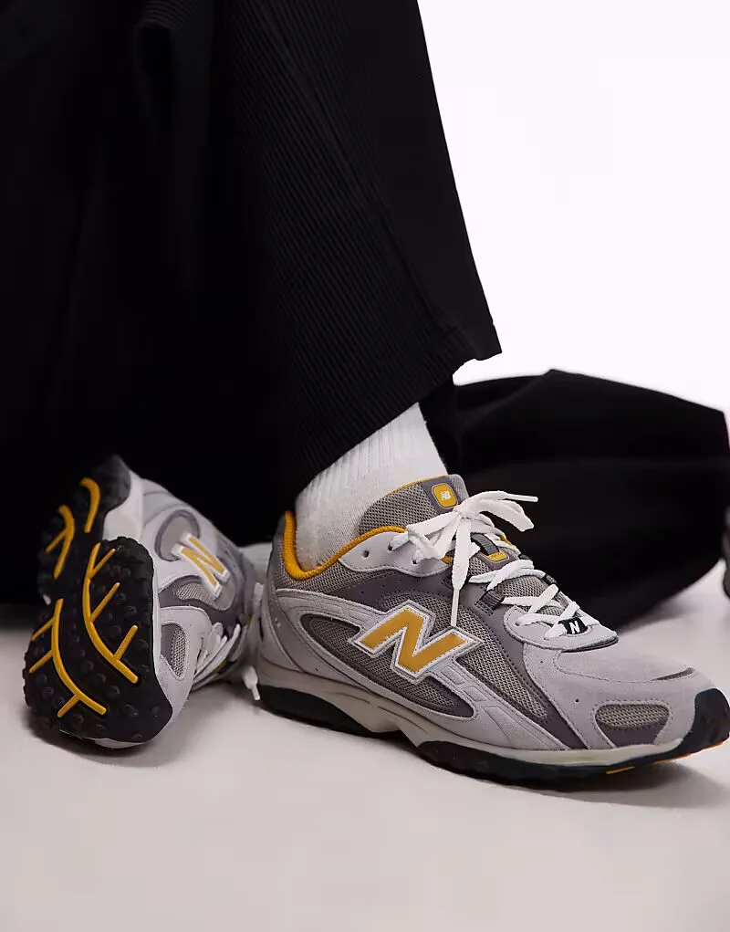 Унисекс кроссовки New Balance 204L из серой и желтой замши — фото 4