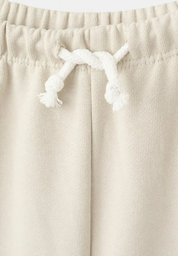 Детские брюки кремового цвета Mango Kids, Off-White — фото 4