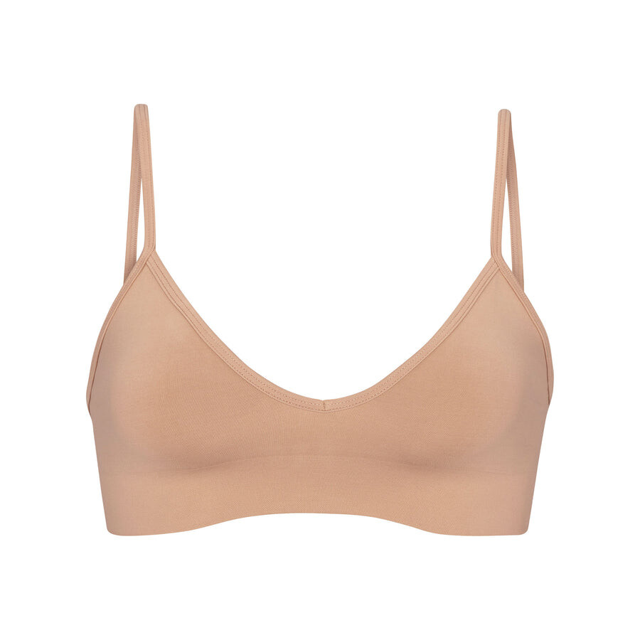 

Бюстгальтер SKIMS Soft Smoothing Seamless, охра