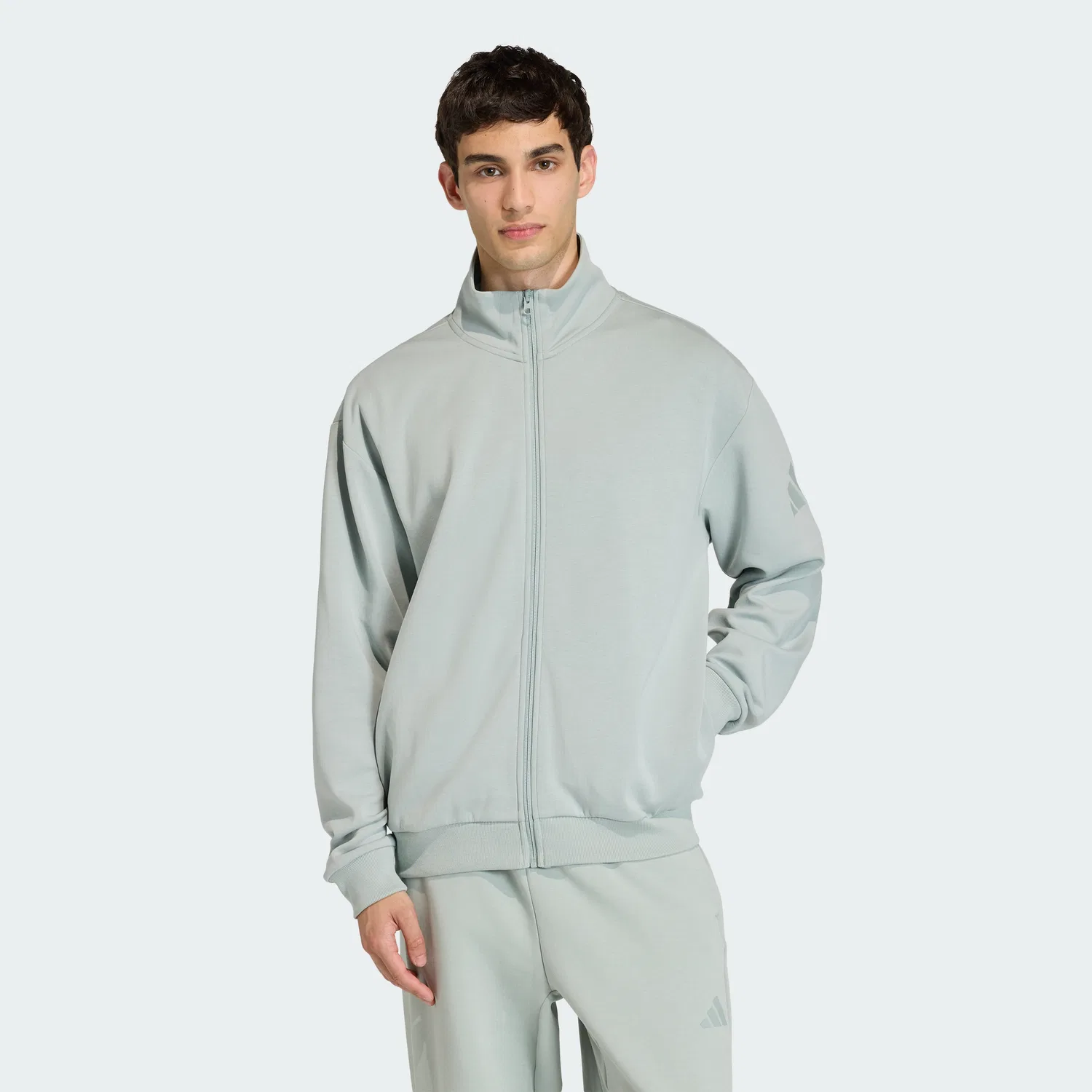 Мужская спортивная куртка Soft Luxe Track Top цвета Wonder Sage от Adidas