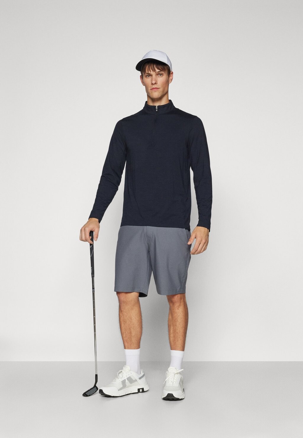 

Рубашка с длинным рукавом THE HEATER 1/4 ZIP TravisMathew, черный