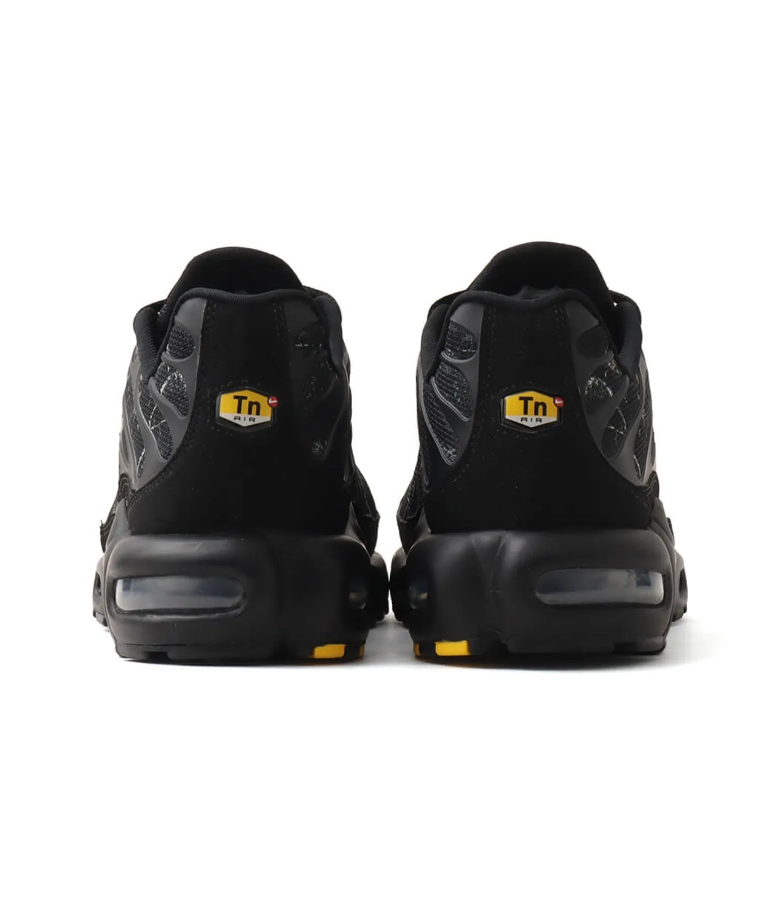 Кроссовки с технологией Tuned Air Nike Air Max Plus SP серые — фото 4