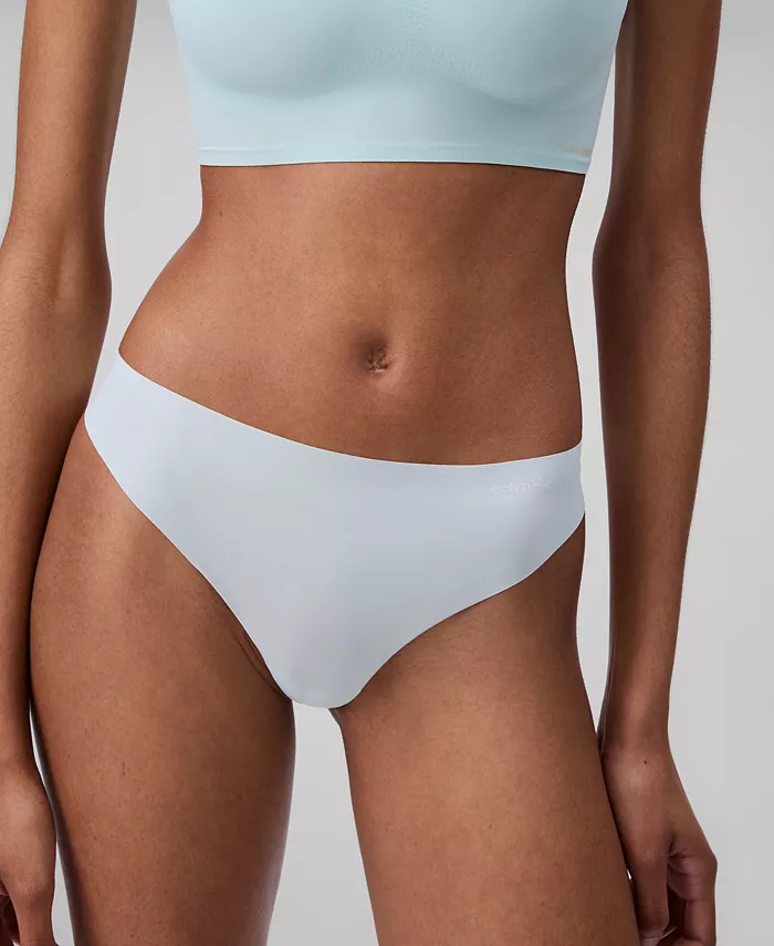 

Женские трусы-стринги Invisibles 3 шт. QD3558 Calvin Klein, серый