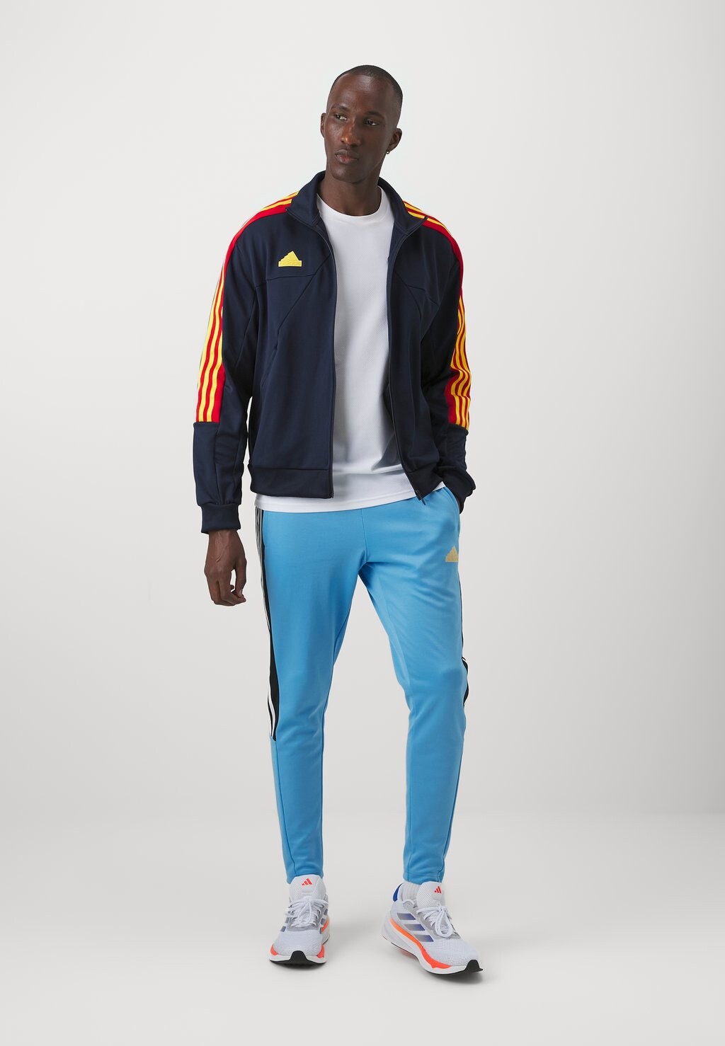 

Тренировочная куртка HOUSE OF TIRO NATIONS PACK TRACK adidas, темно-синий