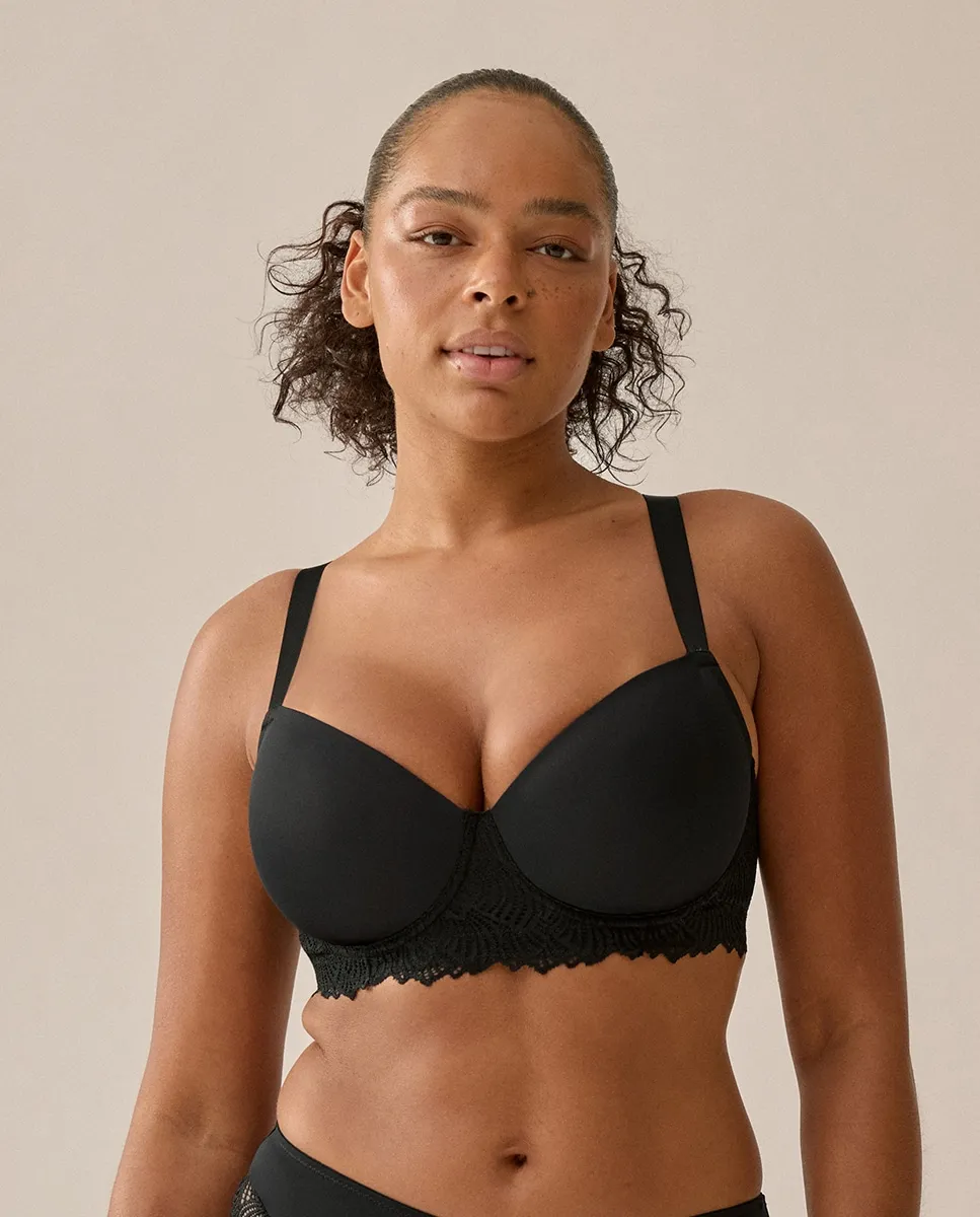 

Бюстгальтер с косточкой, перфорированными чашками и кружевными боковыми вставками Naturana, черный