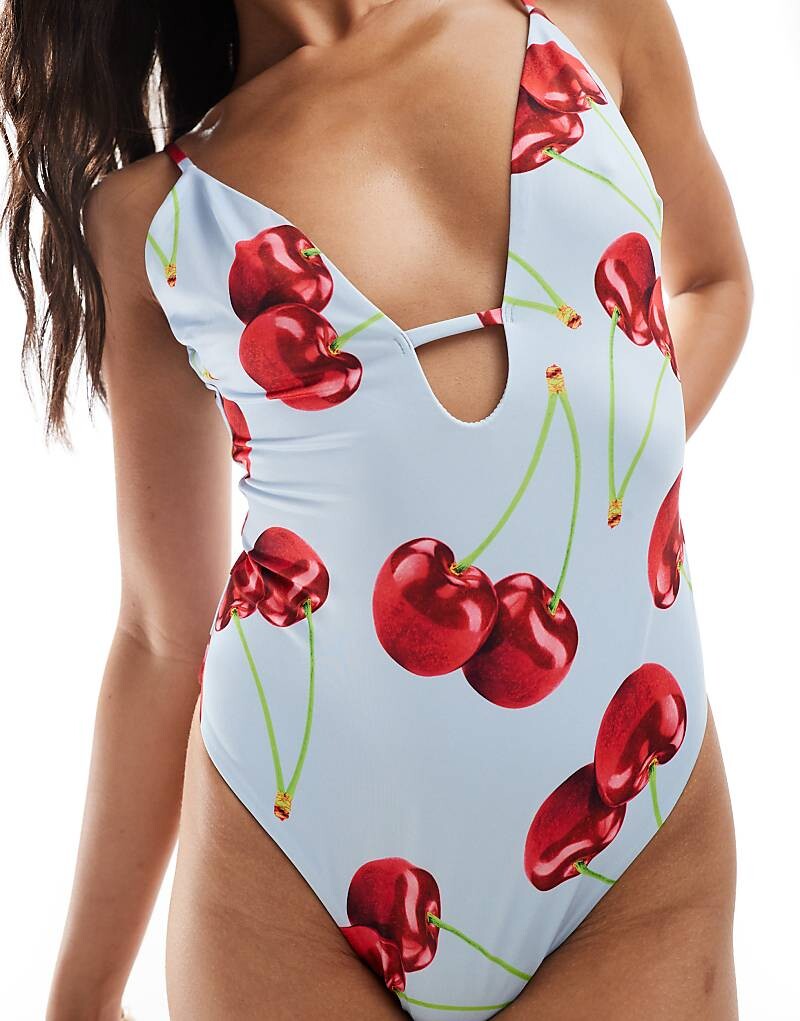 

ASOS DESIGN – Cleo – Купальник с глубоким вырезом, вырезом и вишневым принтом