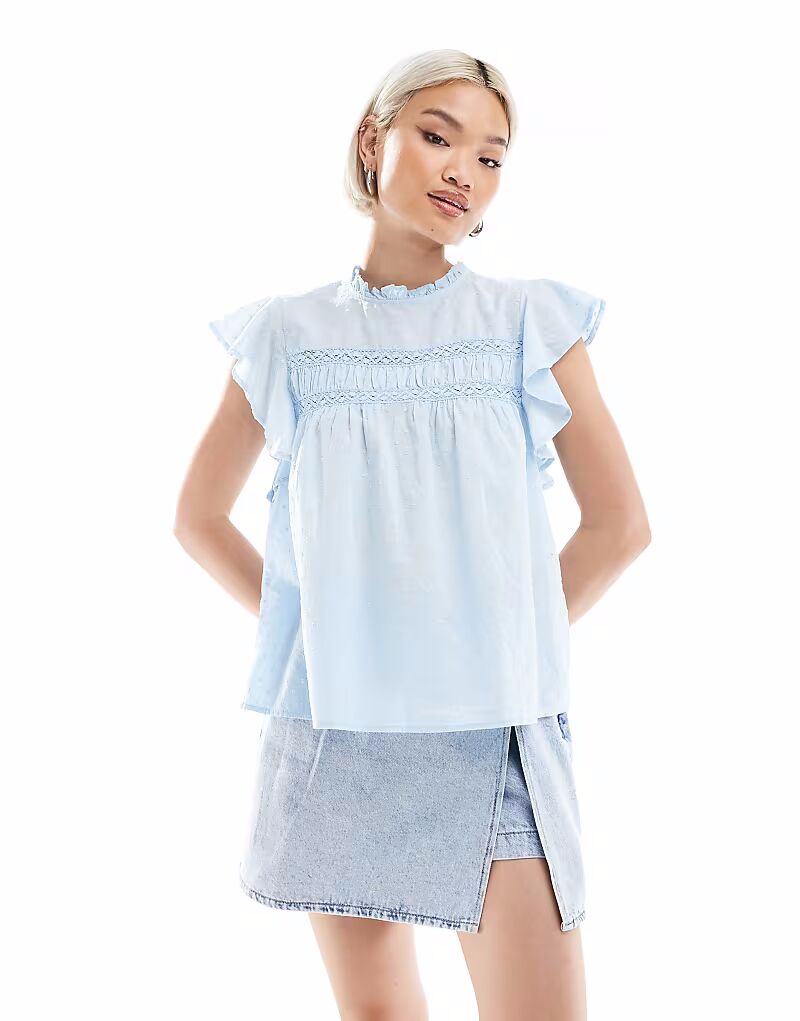 

Вышитый топ Vero Moda с высоким воротом и рукавами-крылышками синего цвета