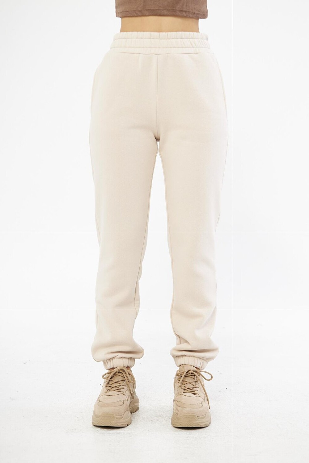 

Бежевые женские спортивные штаны на резинке Chandraswear