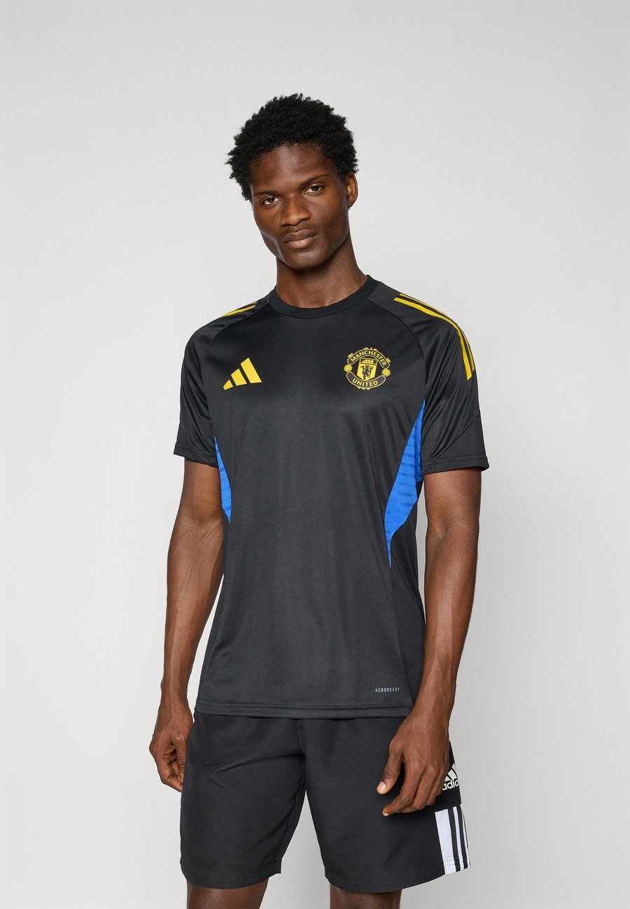 

Футболка Adidas Performance MANCHESTER UNITED 25/26 EUROPEAN TRAINING JERSEY, Black/Blue/Tribe Yellow/Black