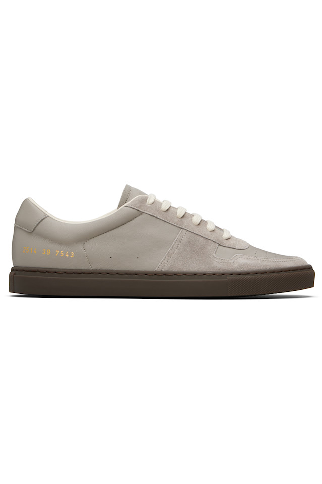 

Common Projects Серые кроссовки для баскетбола с тонкой резиновой подошвой и коричневой подошвой