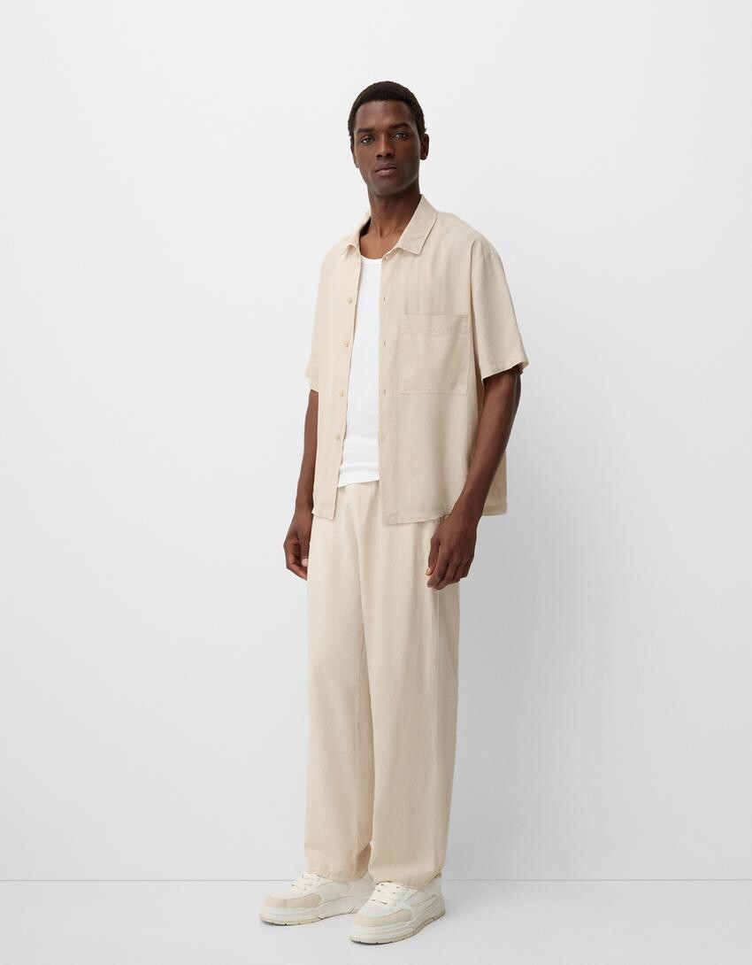 

Широкие льняные брюки Bershka, желтый