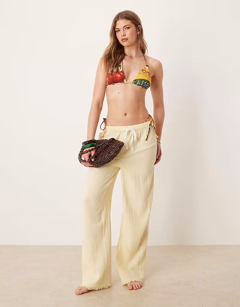 

Пляжные брюки Callie из марли с бахромой цвета пахты Asos Design