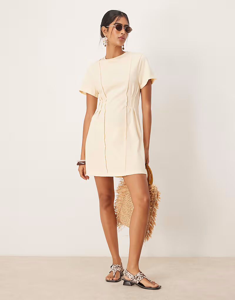 

Платье-футболка мини ASOS DESIGN цвета пахты с завязками