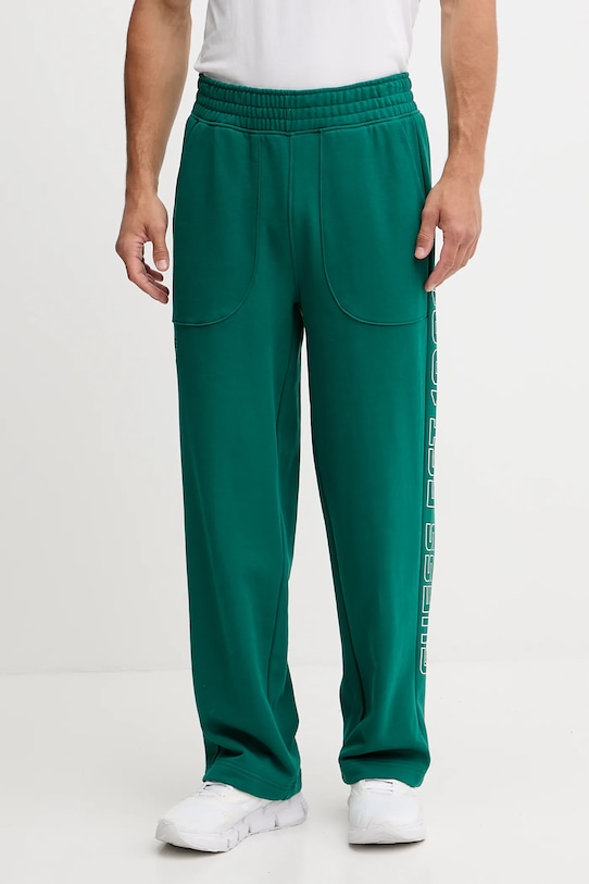 

Хлопковые спортивные брюки Mentore Guess, зеленый